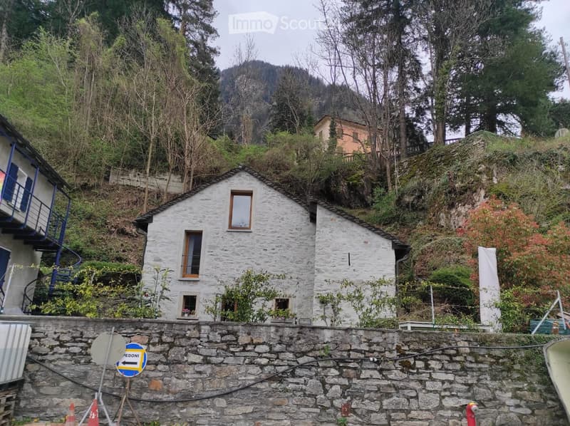 Casa di 2.5 locali con giardino e posteggio (1)