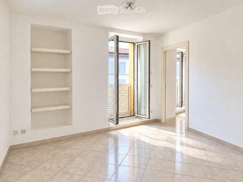2.5 locali con balcone e vista lago nel cuore di Bissone (2)
