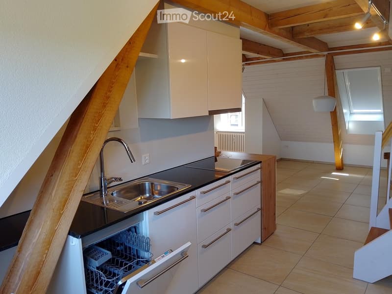 Schöne Dachwohnung in Uzwil mit Aussenparkplatz und Garten (1)