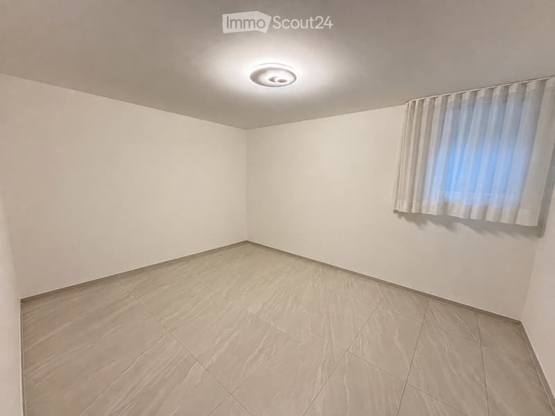 Spazioso 2,5 locali con 55 m² di giardino a Claro (5)