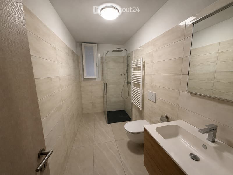 Spazioso 2,5 locali con 55 m² di giardino a Claro (3)