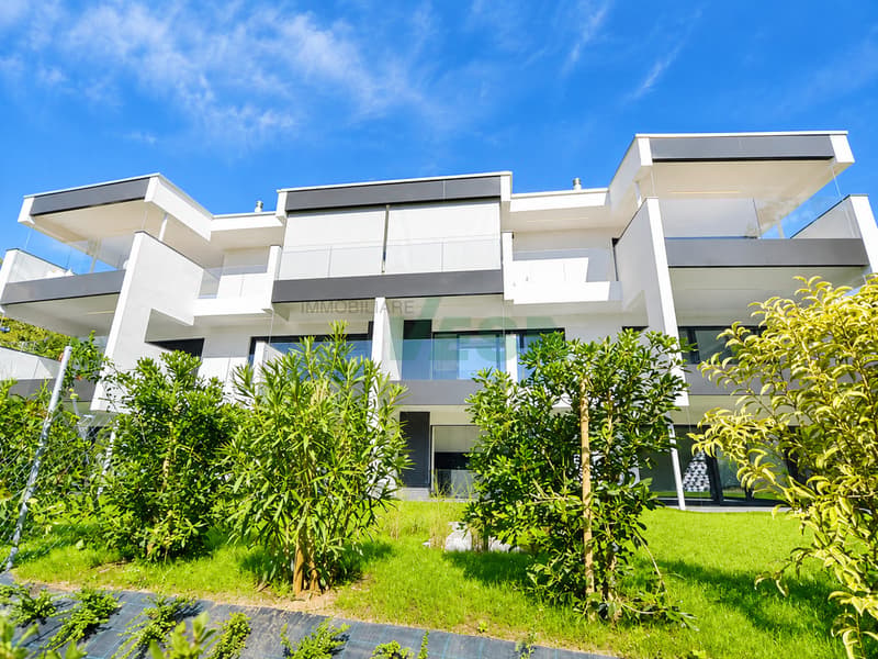 Moderno appartamento 4,5 locali con bella terrazza e giardino privato (2)