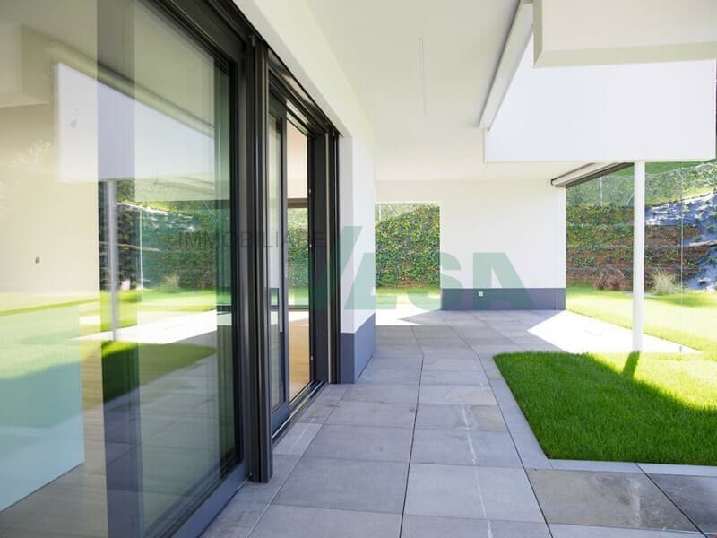 Delizioso attico 3 locali con bella terrazza e parziale vista lago (12)