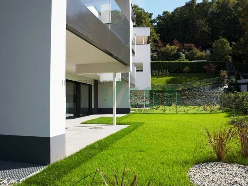 Delizioso attico 3 locali con bella terrazza e parziale vista lago (10)
