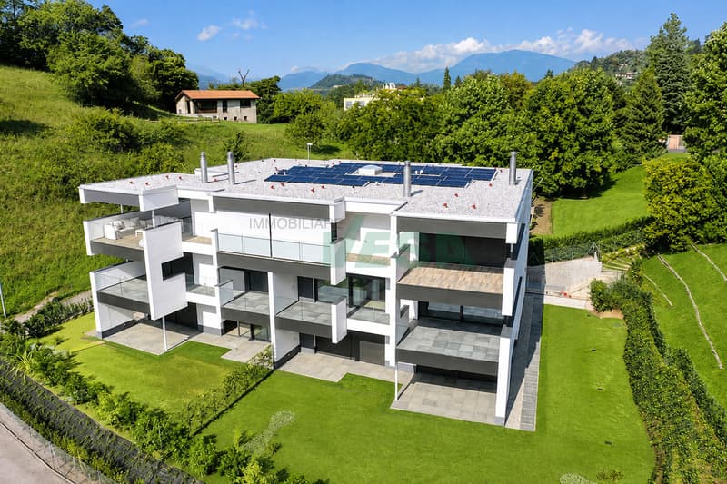Magnifico attico 4,5 locali con grande terrazza e parziale vista lago (3)