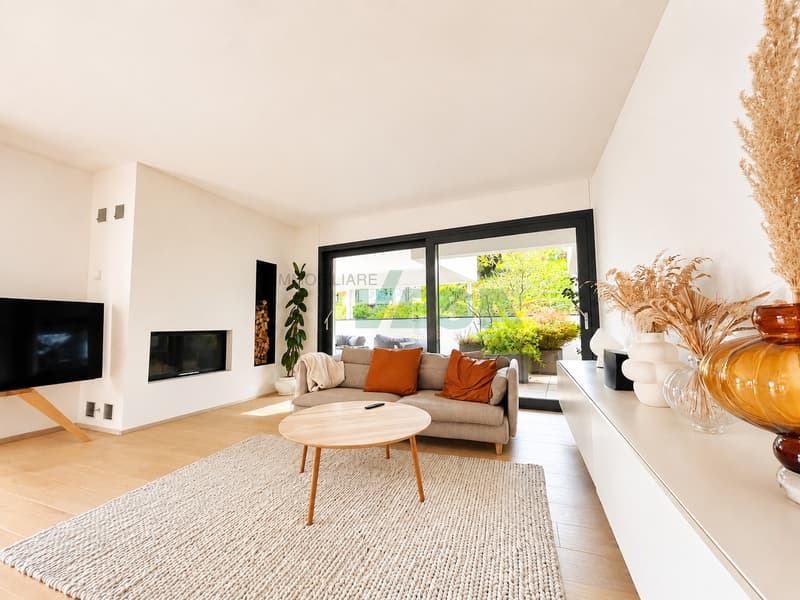 Magnifico attico 4,5 locali con grande terrazza e parziale vista lago (2)