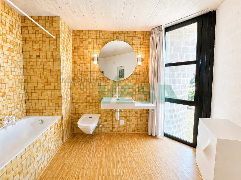 Iconica villa "Casa Rotonda" firmata Mario Botta con bel giardino (12)