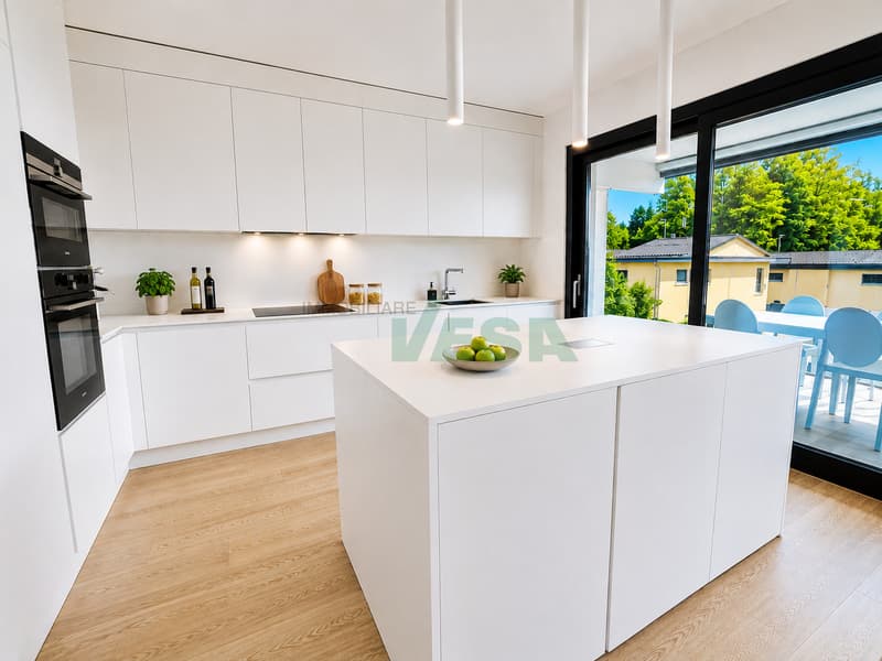 Magnifico attico 4,5 locali con grande terrazza e parziale vista lago (5)