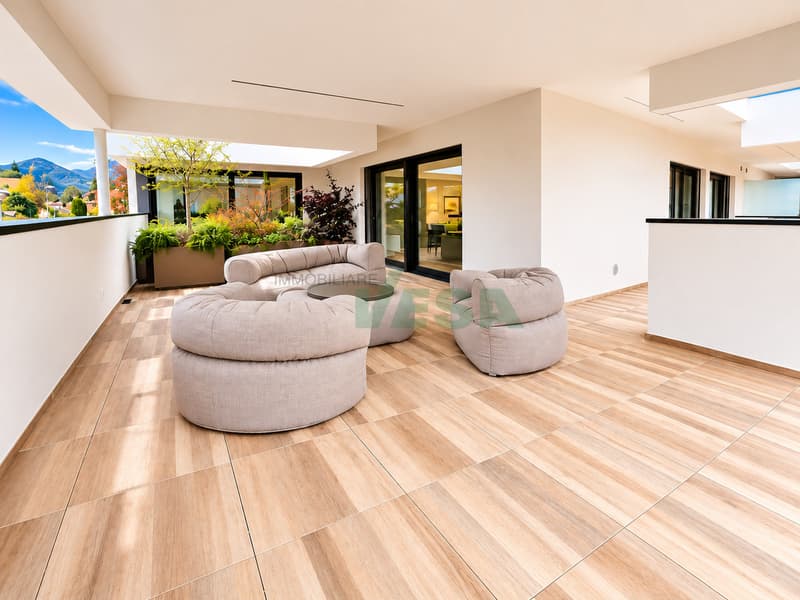 Magnifico attico 4,5 locali con grande terrazza e parziale vista lago (1)