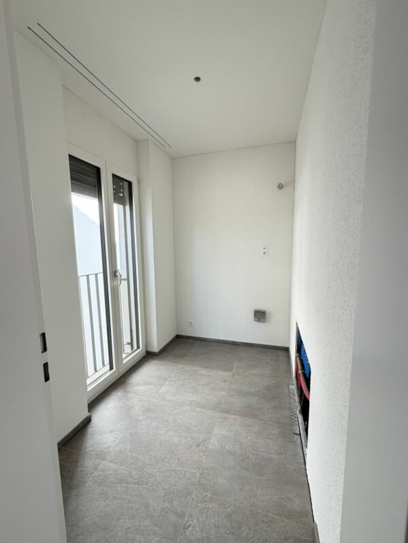 Neubau 3.5 Zimmer-Gartenwohnung mit Einstellhalle (10)