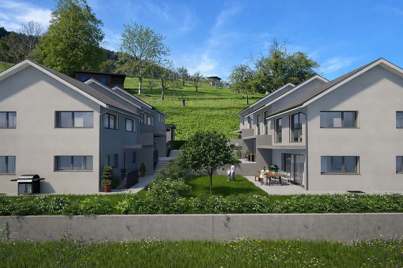 Apartment buildings with 4 units, raised ground floor, spacious lawns in front, and BBQ area