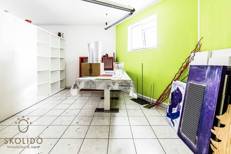 Immeuble résidentiel avec trois appartements de vacances et jardin à ASCONA (53)