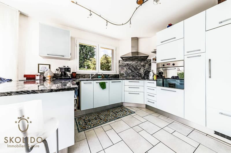 Immeuble résidentiel avec trois appartements de vacances et jardin à ASCONA (44)