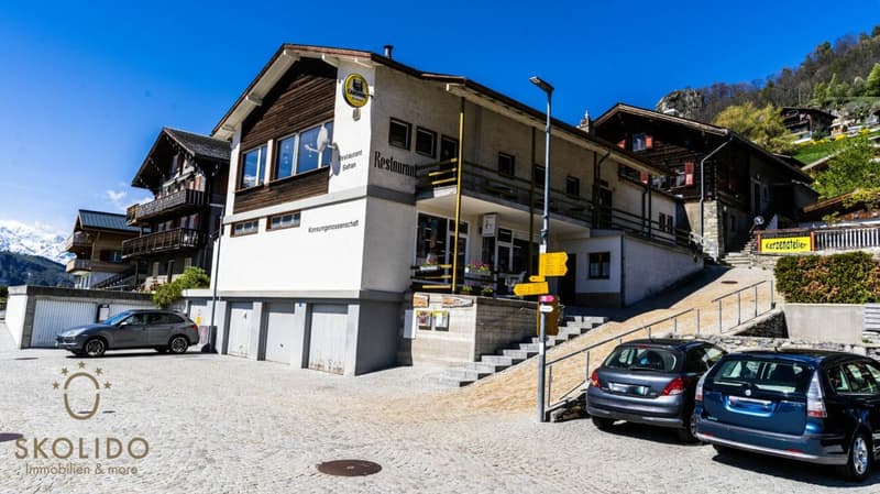Magasin de village, grand restaurant avec terrasse, appartement en duplex, garages et terrain à bâtir au coeur de Mund (22)