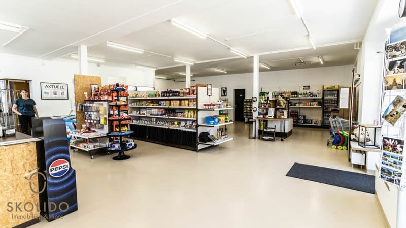 Magasin de village, grand restaurant avec terrasse, appartement en duplex, garages et terrain à bâtir au coeur de Mund (23)