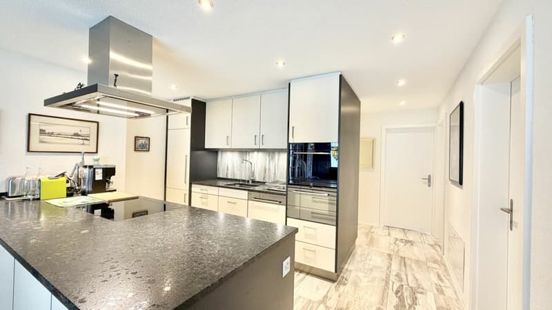 Modern garden apartment with sunny seating area (2)
