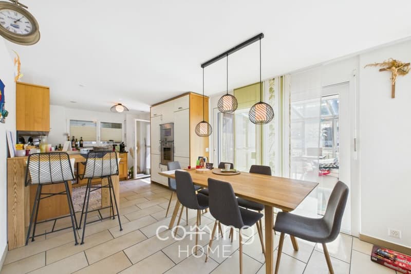 Stylish 5.5-room garden apartment with a sunroom and mountain views in Ried-Brig (1)