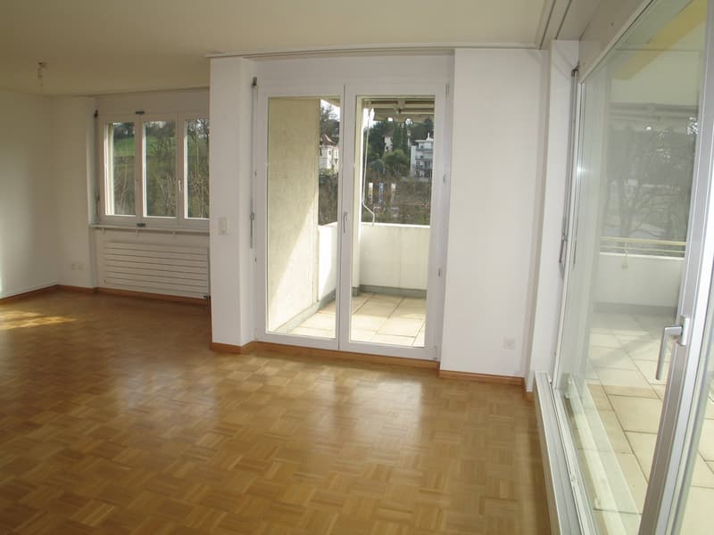 wooden floor, white walls, sliding glass doors to balcony, central heating, sliding balcony