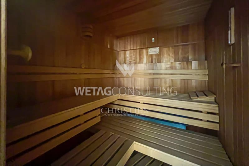 Appartement triplex élégant à Porza avec vue sur le lac, jardin privé, piscine et sauna communs à vendre (12)