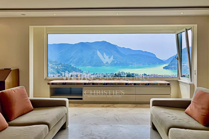 Appartement triplex élégant à Porza avec vue sur le lac, jardin privé, piscine et sauna communs à vendre (3)
