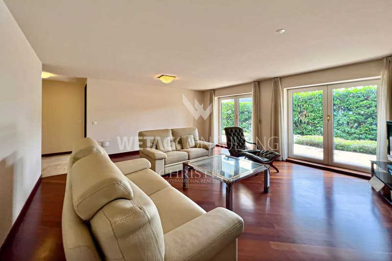 Appartement triplex élégant à Porza avec vue sur le lac, jardin privé, piscine et sauna communs à vendre (9)
