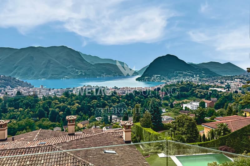 Appartement triplex élégant à Porza avec vue sur le lac, jardin privé, piscine et sauna communs à vendre (1)