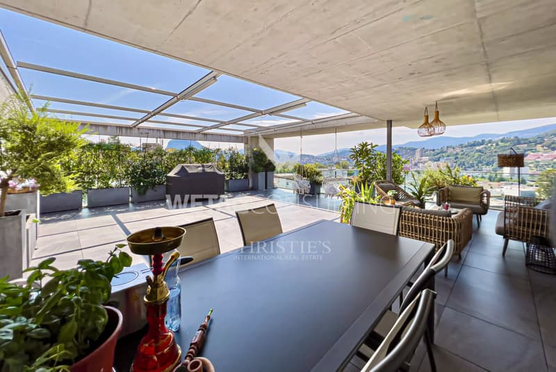 Lugano-Pregassona: grande appartamento penthouse con vista magnifica sulla città e in parte sul lago di Lugano in vendita (1)