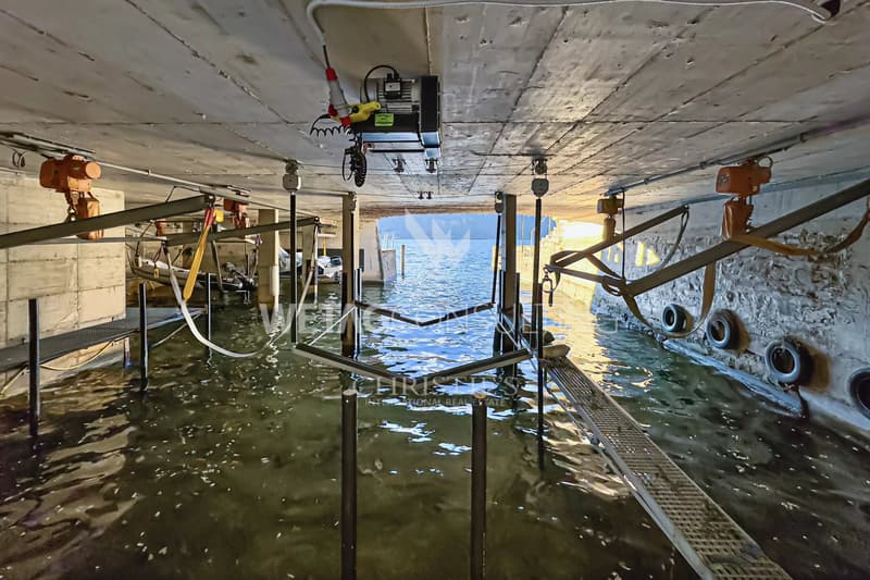 Lugano-Bissone : Appartement avec accès direct au lac, piscine extérieure, vue sur le lac & emplacement de bateau à vendre (13)