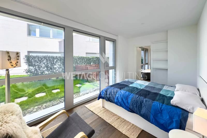 Lugano-Muzzano, à vendre : appartement moderne directement sur le lac de Lugano avec grand jardin privé (5)