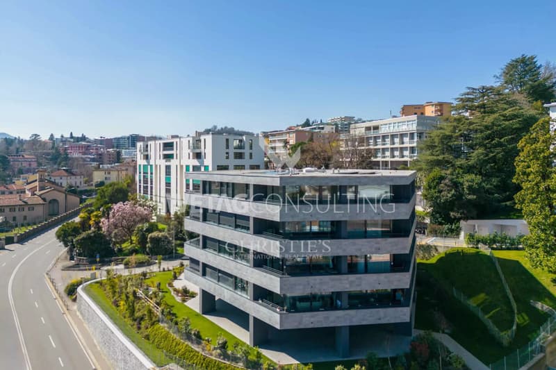 Un penthouse moderne, en cours de construction, avec vue sur la ville et le lac, est à vendre à Lugano (1)