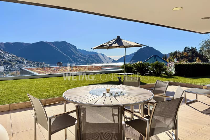 Appartamento a Porza con giardino privato & vista sul lago in vendita (1)