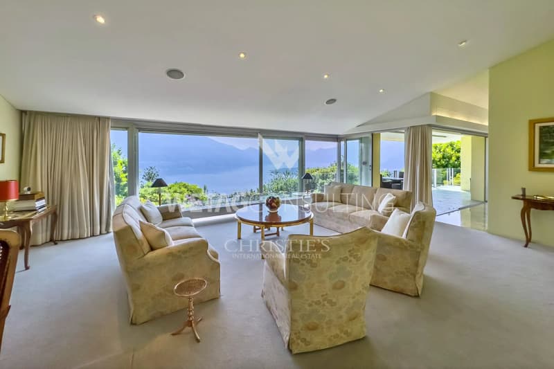 Minusio: Villa élégante avec vue panoramique sur le lac, piscine extérieure & entourée de verdure à vendre (7)