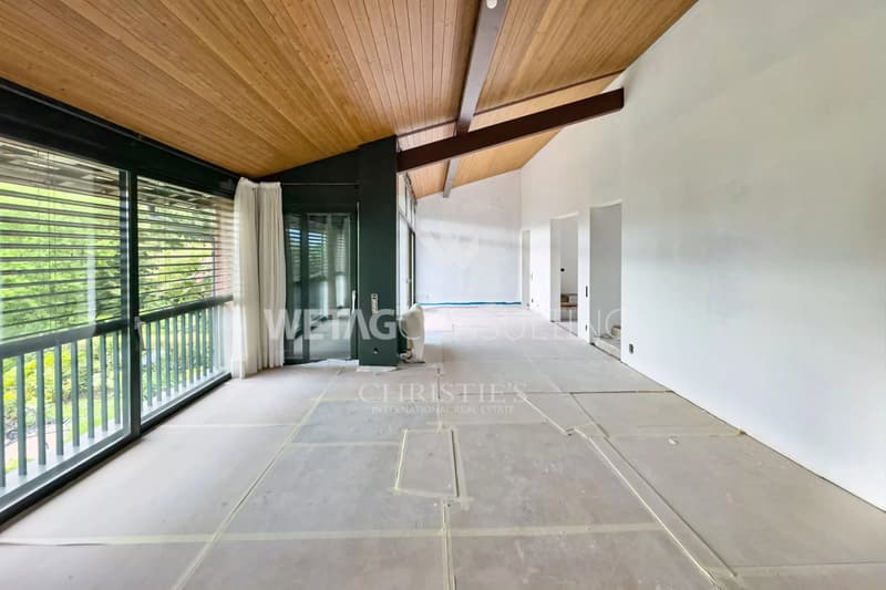 Lugano-Gentilino : appartement élégant au dernier étage avec vue sur le lac, rénové dans l'état brut et à vendre dans un environnement verdoyant (4)