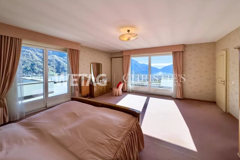 Villa rappresentativa in vendita a Lugano-Comano, con piscina esterna & vista magnifica sul lago di Lugano (7)