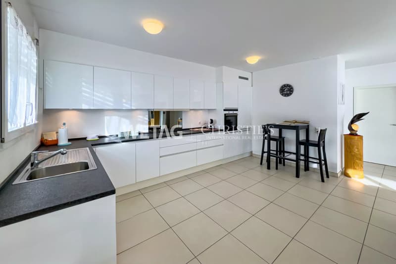 Appartamento mansardato moderno con terrazze spaziose & vista sul Lago Maggiore a Brissago in vendita (4)
