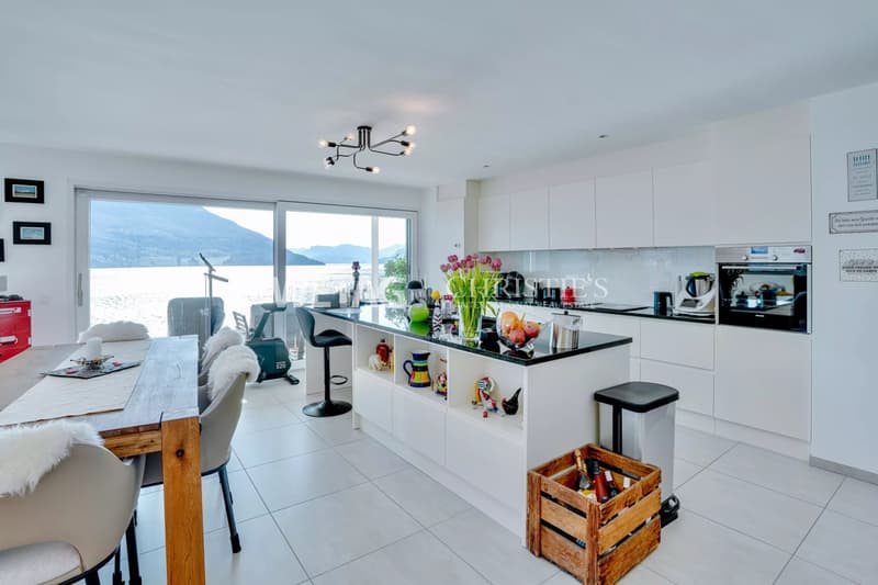 Appartamento luminoso & moderno con grande terrazza e vista panoramica a Brissago in vendita (10)