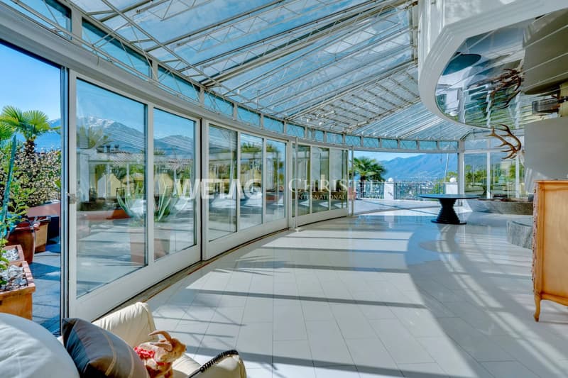 Muralto: Modern, bright apartment with large terrace & elegant glass architecture for sale (4)