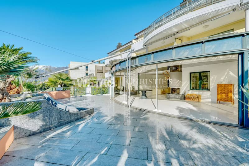 Muralto: Modern, bright apartment with large terrace & elegant glass architecture for sale (2)
