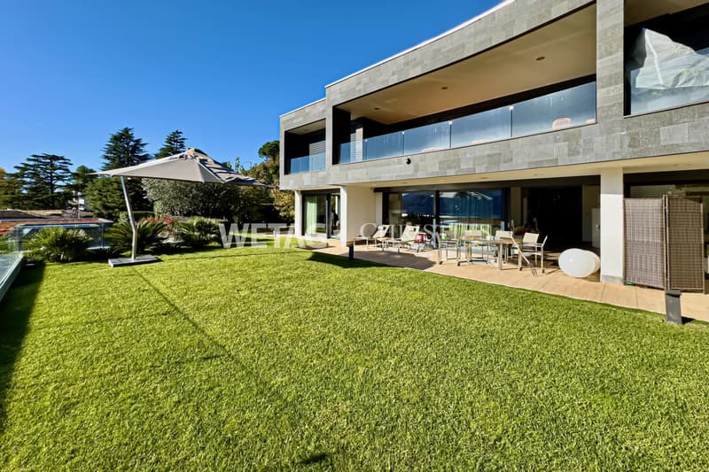 Appartement à Porza avec jardin privé & vue sur le lac à louer (1)