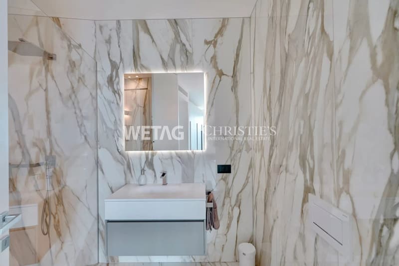 In vendita a Lugano-Vernate: Appartamento mansardato moderno con vista spettacolare sul Lago di Lugano & giardino privato (11)