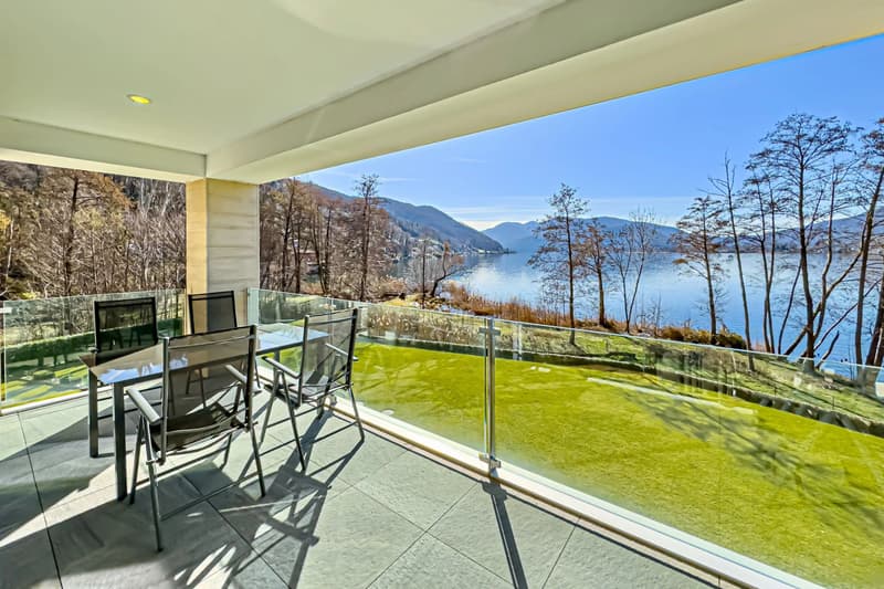 Lugano-Muzzano: Elegante möblierte 3.5-Zimmer-Wohnung mit direktem Zugang zum Luganersee zu verkaufen (1)