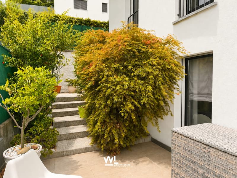 Spacious 5.5-room single-family house with a far-reaching view, terraces, and garden for sale in Vacallo (13)