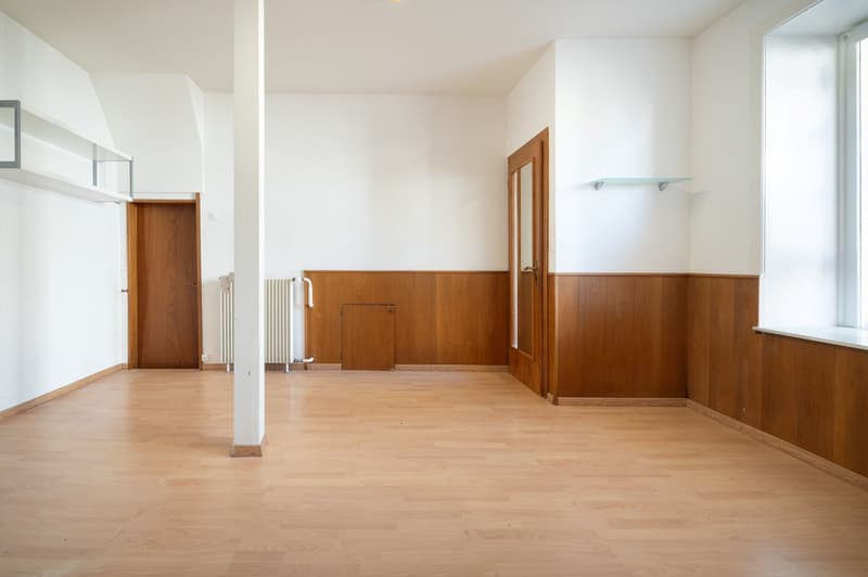Corner single-family house with commercial space, garage box, and seating area (11)