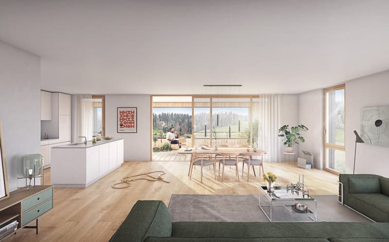 Open-concept living space with kitchen, dining area, and living room. Large windows provide a scenic view of the surrounding landscape. The room features hardwood floors, white walls, and modern furniture including a sofa, coffee table, and dining table w