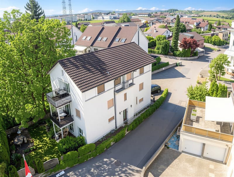 Mehrfamilienhaus mit drei Wohneinheiten im familienfreundlichen Quarti (4)