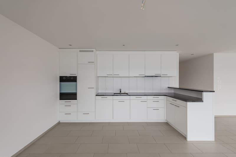 Helle 3.5-Zimmerwohnung mit grosszügigem Sitzplatz im Herzen von Fehraltorf (2)