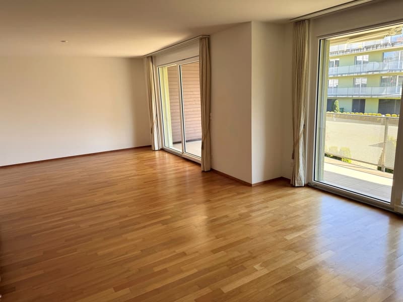 empty room, wooden floor, sliding glass doors, balcony, white walls, curtains