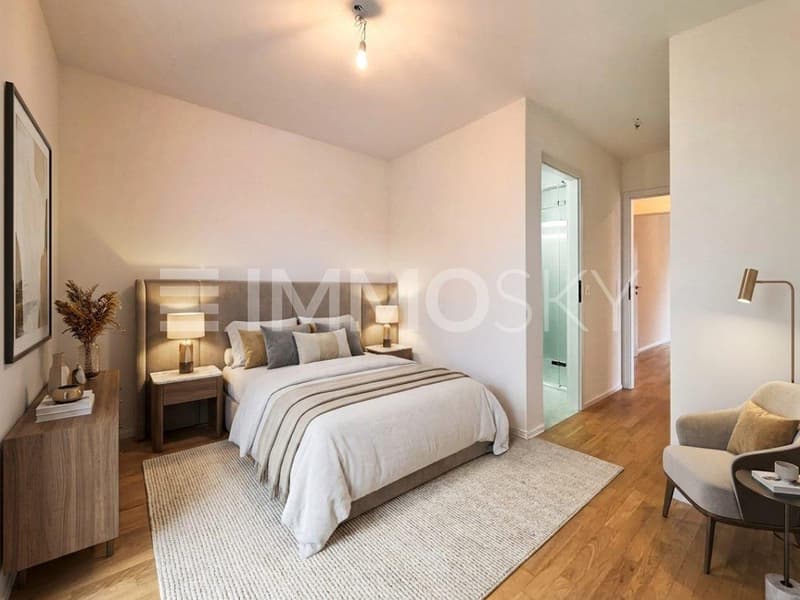 Chambre parentale avec salle de douche et accès terrasse
