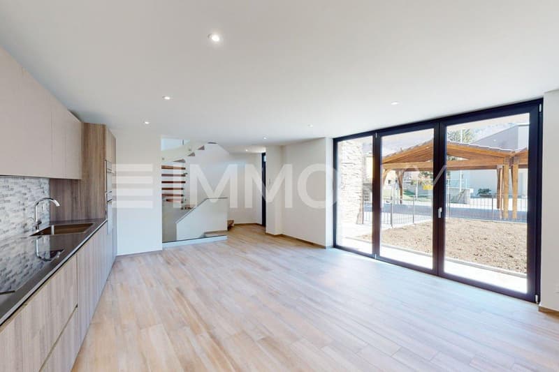 Soggiorno con cucina open-space