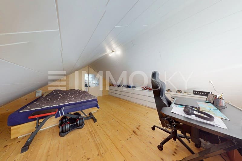 Chambre à coucher avec espace bureau
